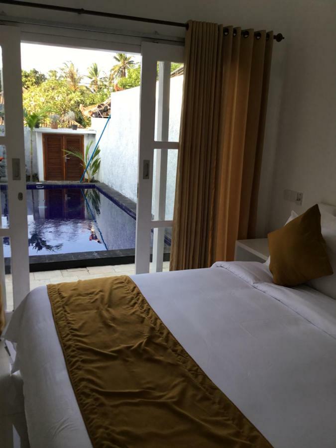 Queen Guest House Tulamben Экстерьер фото